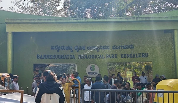 Visitors gathering at the main entrance gate of Bannerghatta Biological Park Bengaluru, a major weekend attraction near Godrej Castillo.