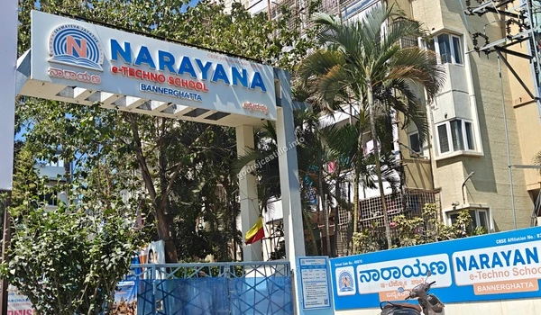 The multi-story building and entrance arch of Narayana e-Techno School, ensuring access to quality CBSE curriculums for Godrej Castillo families