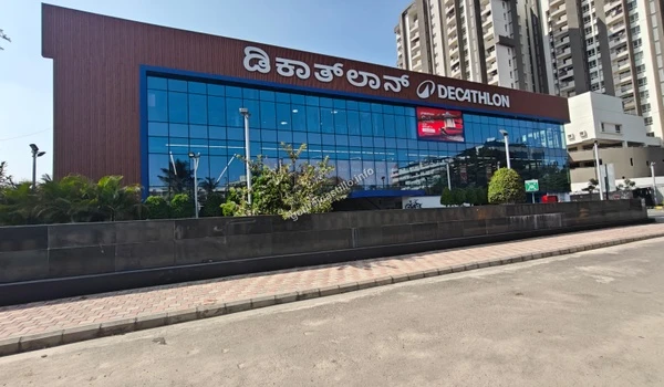 Decathlon sports shopping destination surrounded by high-rise residential buildings, a quick drive from Godrej Castillo