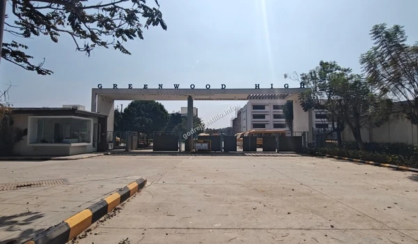 Greenwood High school facade and security gate, representing the premium educational hub surrounding the Godrej Castillo property