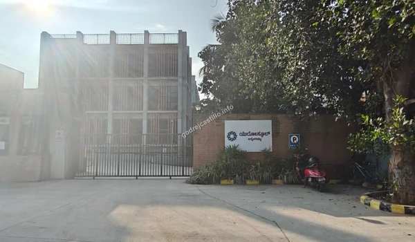 The secure entrance gate of EuroSchool under the morning sun, representing the excellent early and primary education near Godrej Castillo