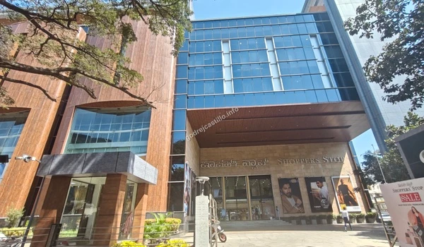 A wider view of the massive glass building housing Shoppers Stop and other premium brands easily accessible to the Godrej Castillo community