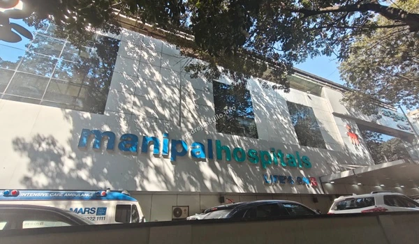 Main signage and entrance of Manipal Hospitals ensuring excellent multi-specialty care near Godrej Castillo.