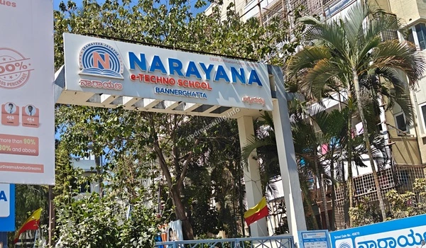 A bright daytime view of the Narayana e-Techno School banner, offering competitive educational curriculum right in the vicinity of Godrej Castillo