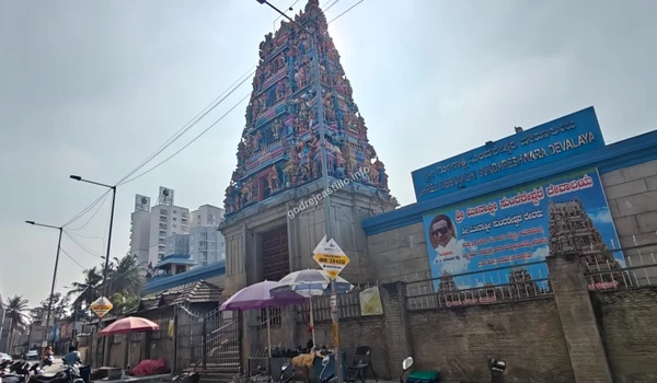 Street view of the neighborhood temple entrance showcasing the spiritual and cultural infrastructure surrounding the Godrej Castillo project