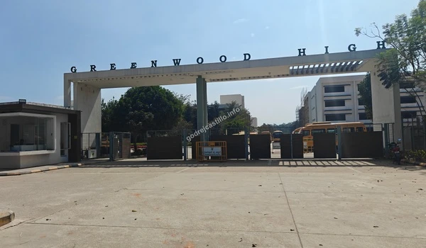 Frontal perspective of Greenwood High showing the secure entrance and school buildings, highly accessible from Godrej Castillo