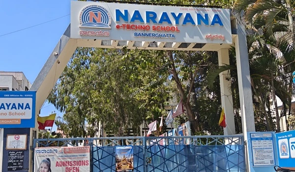Main gate and large signboards of Narayana e-Techno School, providing top technical schooling foundations close to the Godrej Castillo community