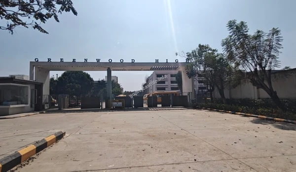 Exterior view of the Greenwood High gate from the street, emphasizing the easy access to quality education for residents of Godrej Castillo